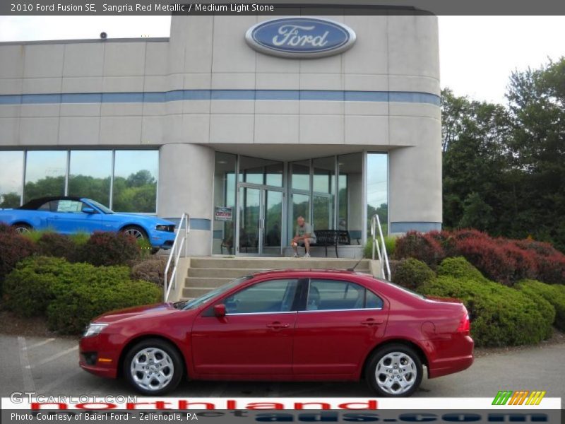 Sangria Red Metallic / Medium Light Stone 2010 Ford Fusion SE