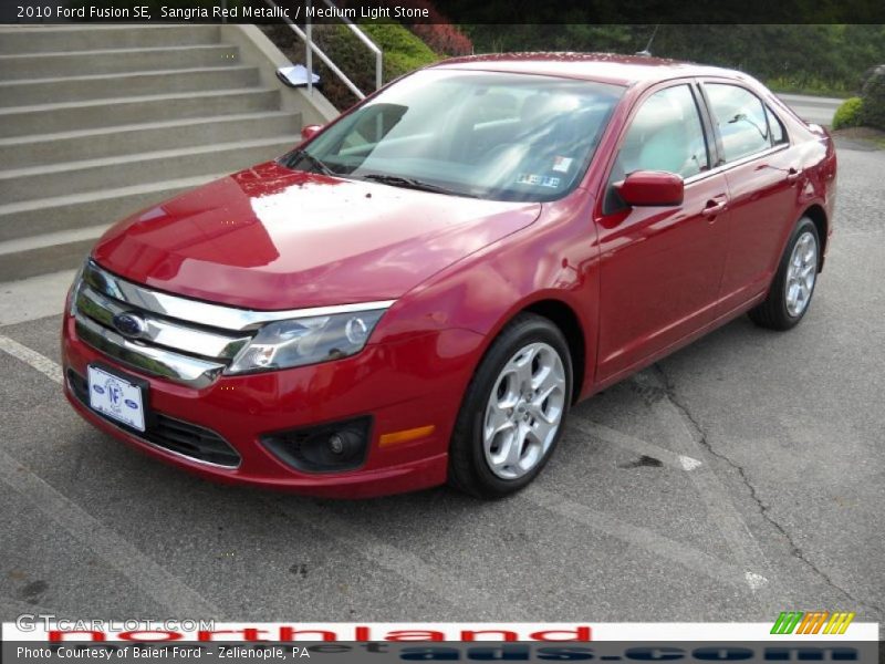 Sangria Red Metallic / Medium Light Stone 2010 Ford Fusion SE
