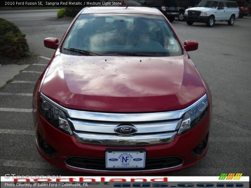 Sangria Red Metallic / Medium Light Stone 2010 Ford Fusion SE
