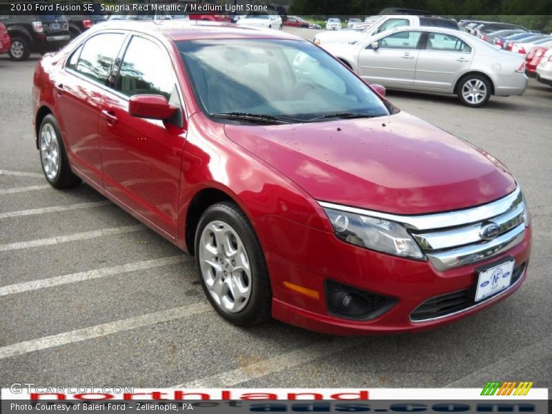 Sangria Red Metallic / Medium Light Stone 2010 Ford Fusion SE