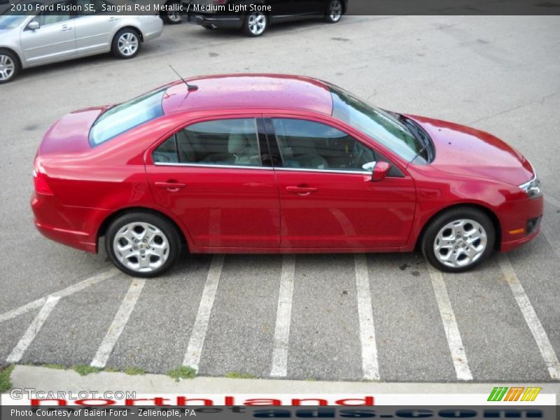 Sangria Red Metallic / Medium Light Stone 2010 Ford Fusion SE