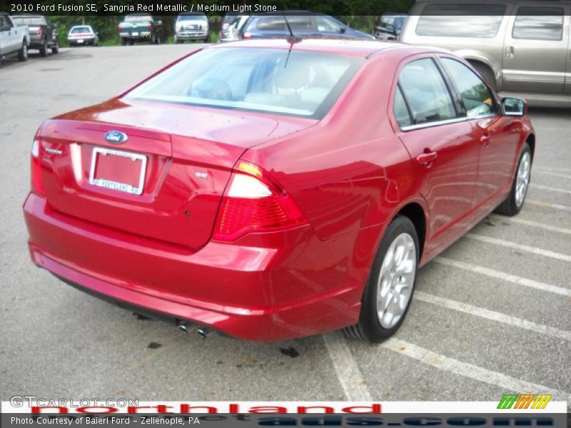 Sangria Red Metallic / Medium Light Stone 2010 Ford Fusion SE