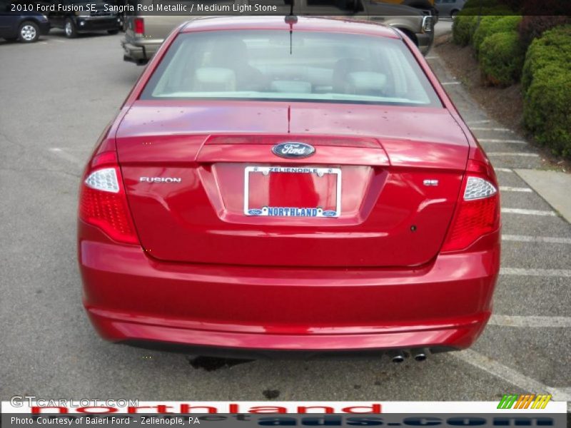 Sangria Red Metallic / Medium Light Stone 2010 Ford Fusion SE