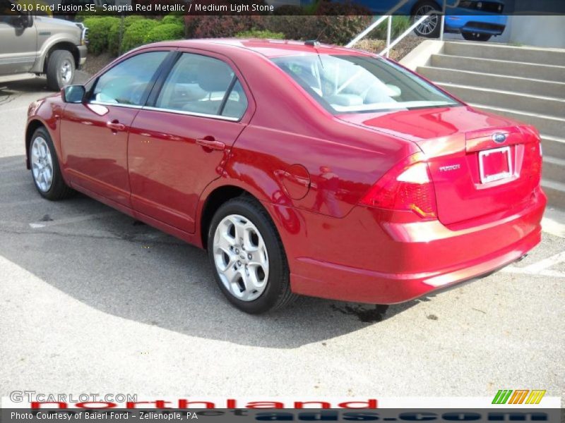 Sangria Red Metallic / Medium Light Stone 2010 Ford Fusion SE