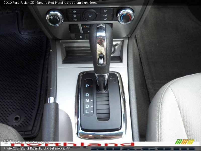 Sangria Red Metallic / Medium Light Stone 2010 Ford Fusion SE