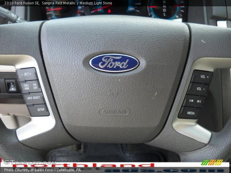 Sangria Red Metallic / Medium Light Stone 2010 Ford Fusion SE