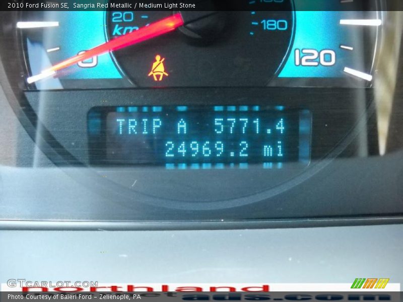 Sangria Red Metallic / Medium Light Stone 2010 Ford Fusion SE