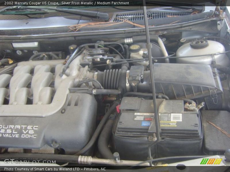 Silver Frost Metallic / Medium Parchment 2002 Mercury Cougar V6 Coupe