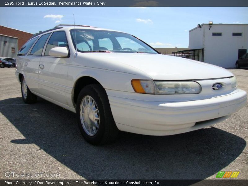 Performance White / Grey 1995 Ford Taurus LX Sedan
