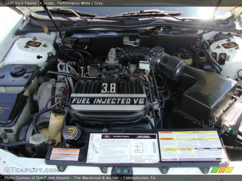 Performance White / Grey 1995 Ford Taurus LX Sedan