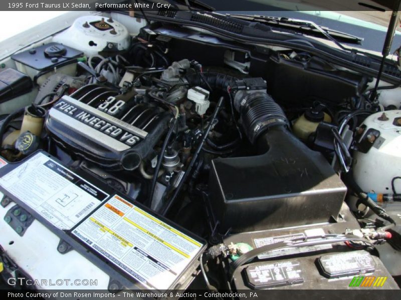 Performance White / Grey 1995 Ford Taurus LX Sedan