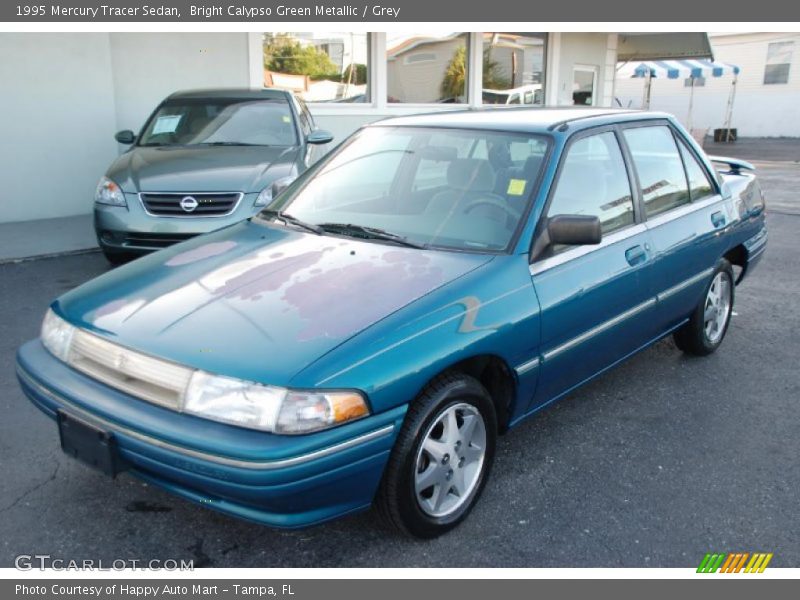 Bright Calypso Green Metallic / Grey 1995 Mercury Tracer Sedan