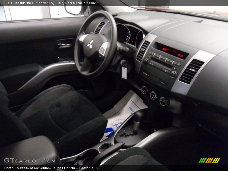 Rally Red Metallic / Black 2010 Mitsubishi Outlander ES