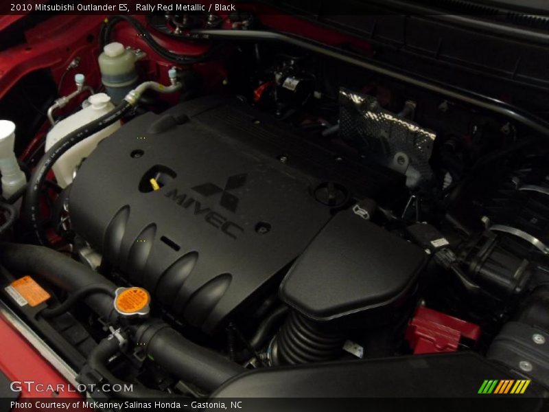 Rally Red Metallic / Black 2010 Mitsubishi Outlander ES