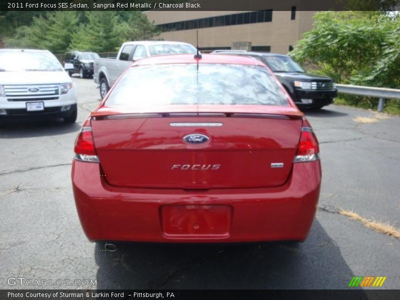Sangria Red Metallic / Charcoal Black 2011 Ford Focus SES Sedan