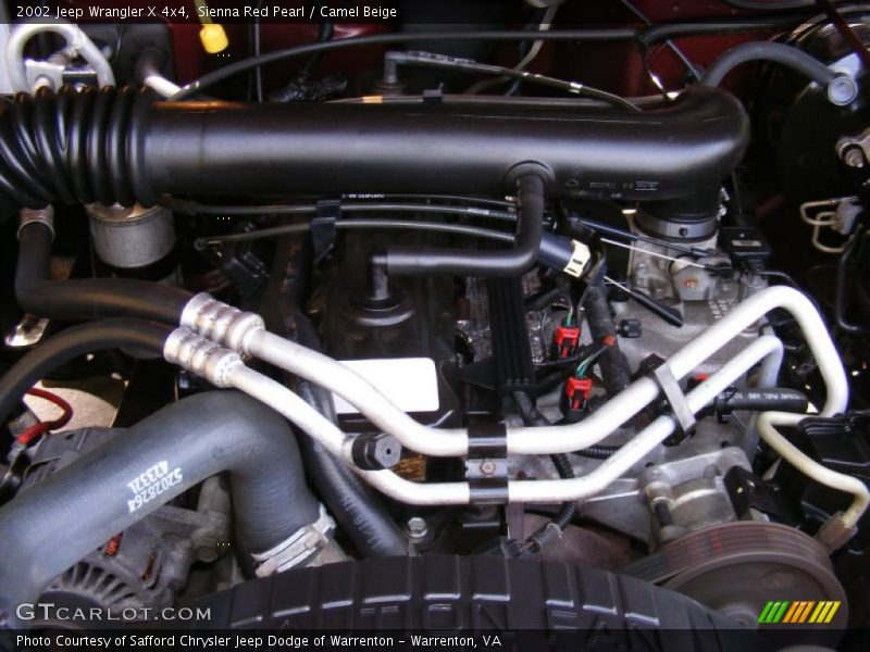 Sienna Red Pearl / Camel Beige 2002 Jeep Wrangler X 4x4