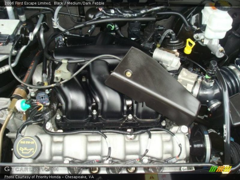 Black / Medium/Dark Pebble 2006 Ford Escape Limited