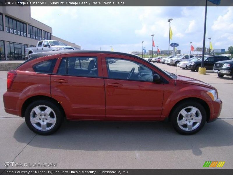 Sunburst Orange Pearl / Pastel Pebble Beige 2009 Dodge Caliber SXT