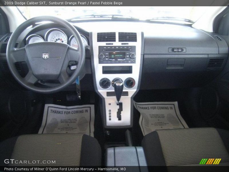 Sunburst Orange Pearl / Pastel Pebble Beige 2009 Dodge Caliber SXT