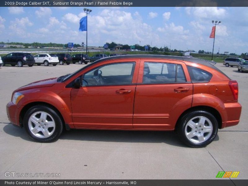 Sunburst Orange Pearl / Pastel Pebble Beige 2009 Dodge Caliber SXT