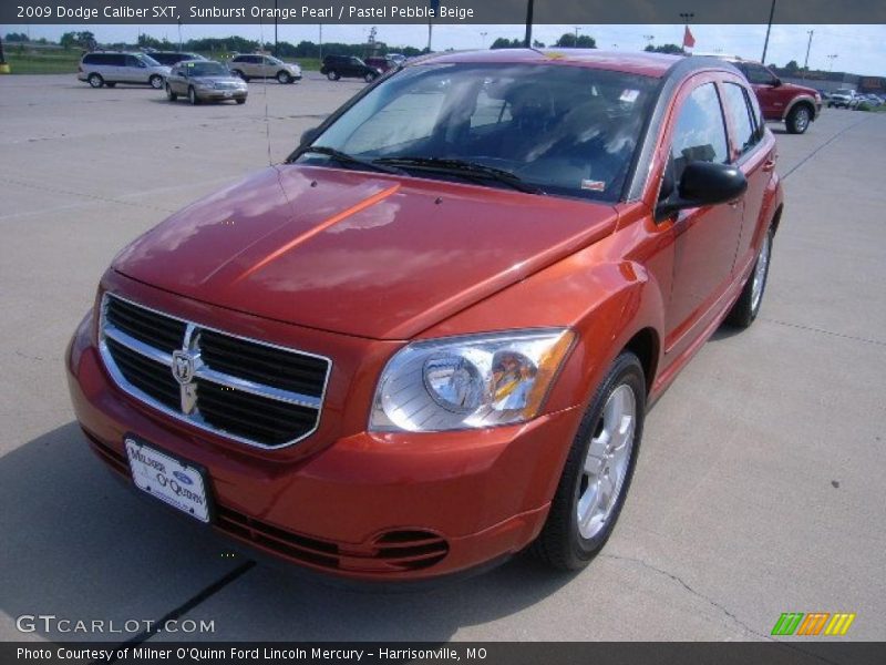 Sunburst Orange Pearl / Pastel Pebble Beige 2009 Dodge Caliber SXT