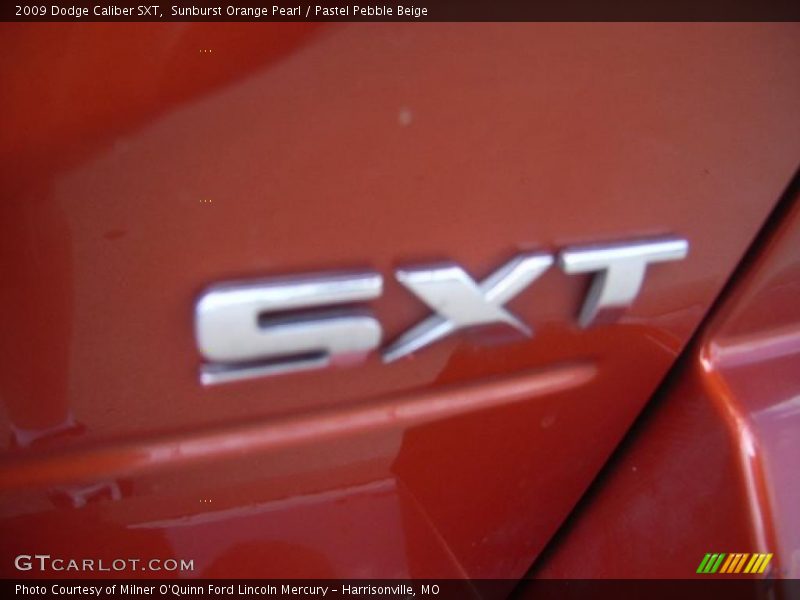 Sunburst Orange Pearl / Pastel Pebble Beige 2009 Dodge Caliber SXT
