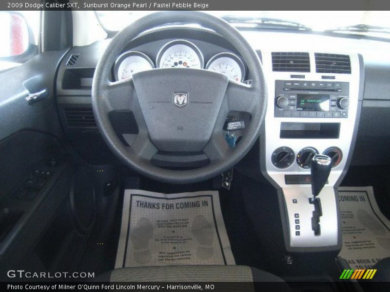 Sunburst Orange Pearl / Pastel Pebble Beige 2009 Dodge Caliber SXT