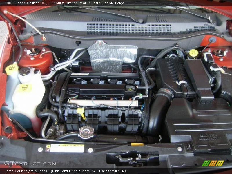 Sunburst Orange Pearl / Pastel Pebble Beige 2009 Dodge Caliber SXT