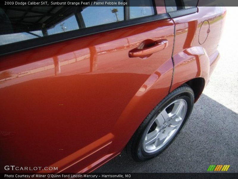 Sunburst Orange Pearl / Pastel Pebble Beige 2009 Dodge Caliber SXT