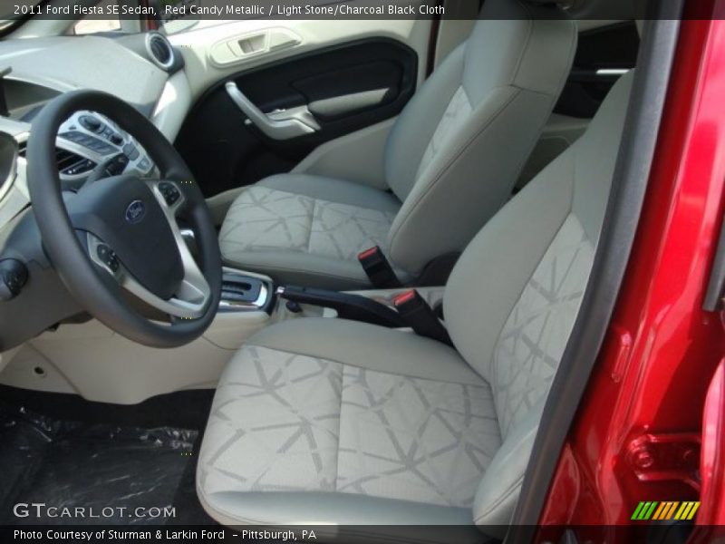 Red Candy Metallic / Light Stone/Charcoal Black Cloth 2011 Ford Fiesta SE Sedan