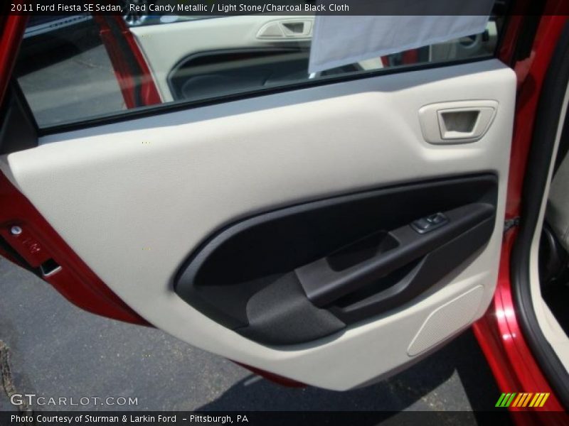 Red Candy Metallic / Light Stone/Charcoal Black Cloth 2011 Ford Fiesta SE Sedan