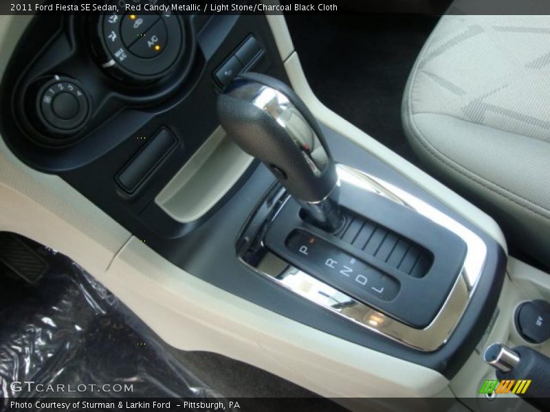 Red Candy Metallic / Light Stone/Charcoal Black Cloth 2011 Ford Fiesta SE Sedan
