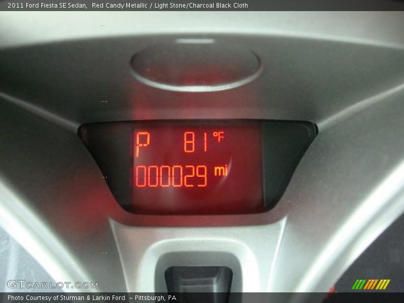 Red Candy Metallic / Light Stone/Charcoal Black Cloth 2011 Ford Fiesta SE Sedan
