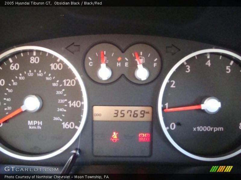 Obsidian Black / Black/Red 2005 Hyundai Tiburon GT
