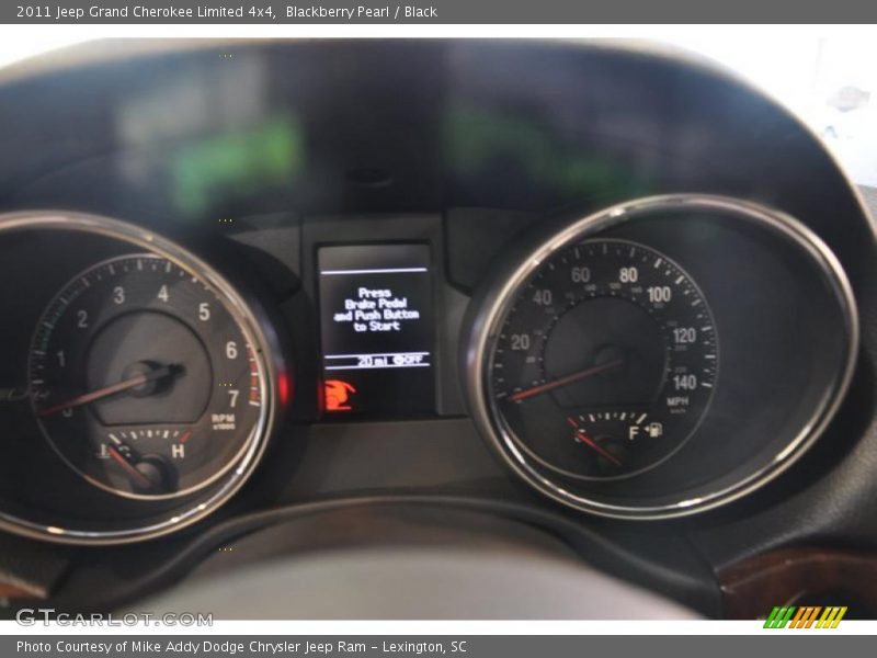 Blackberry Pearl / Black 2011 Jeep Grand Cherokee Limited 4x4