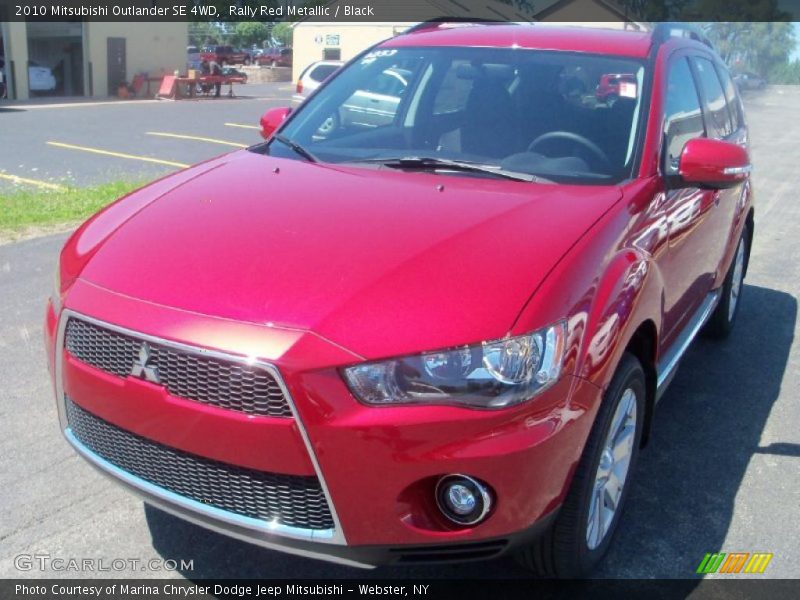 Rally Red Metallic / Black 2010 Mitsubishi Outlander SE 4WD