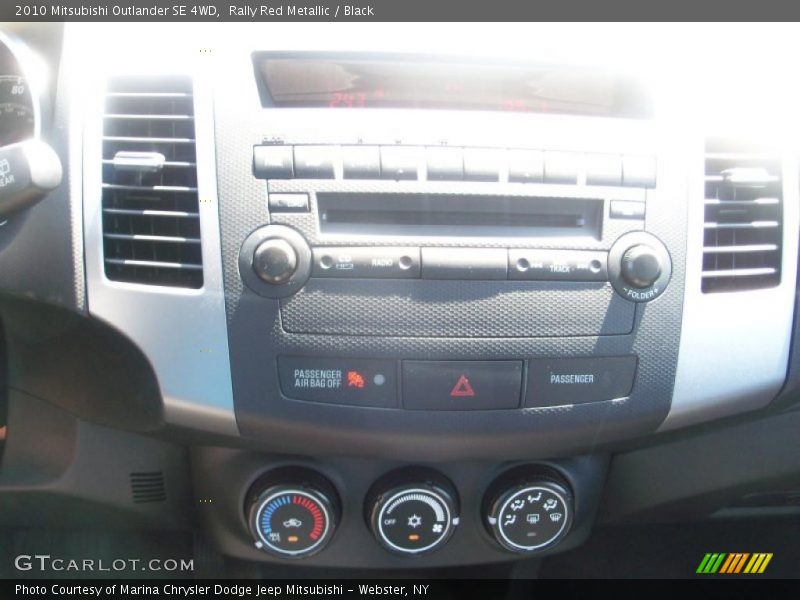 Rally Red Metallic / Black 2010 Mitsubishi Outlander SE 4WD
