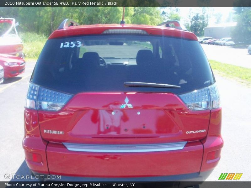 Rally Red Metallic / Black 2010 Mitsubishi Outlander SE 4WD