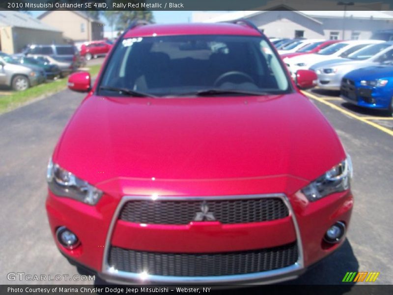 Rally Red Metallic / Black 2010 Mitsubishi Outlander SE 4WD