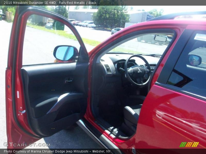 Rally Red Metallic / Black 2010 Mitsubishi Outlander SE 4WD