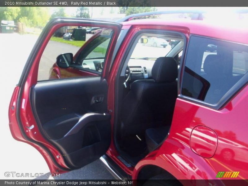 Rally Red Metallic / Black 2010 Mitsubishi Outlander SE 4WD