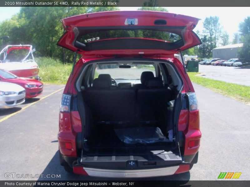 Rally Red Metallic / Black 2010 Mitsubishi Outlander SE 4WD