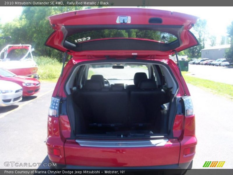 Rally Red Metallic / Black 2010 Mitsubishi Outlander SE 4WD