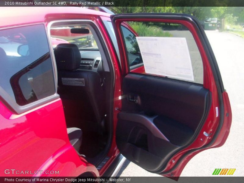 Rally Red Metallic / Black 2010 Mitsubishi Outlander SE 4WD