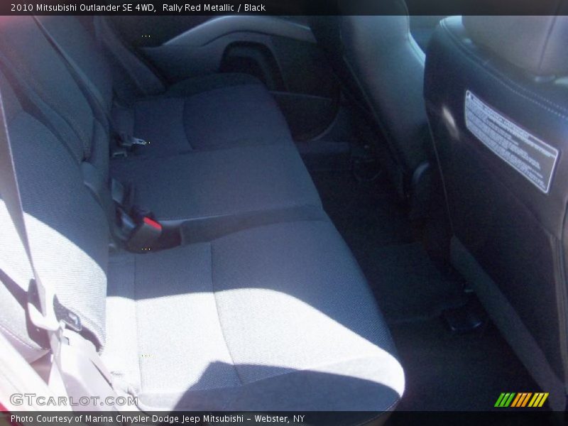 Rally Red Metallic / Black 2010 Mitsubishi Outlander SE 4WD