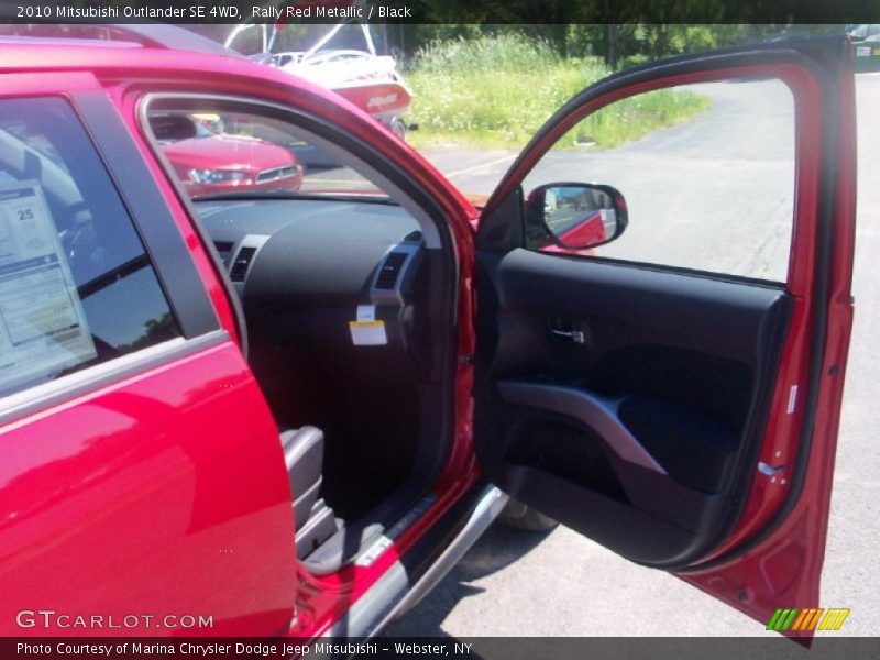 Rally Red Metallic / Black 2010 Mitsubishi Outlander SE 4WD