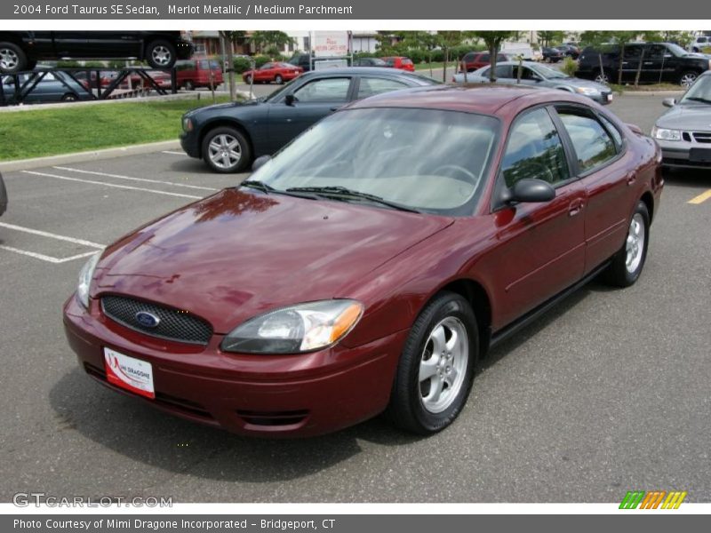 Merlot Metallic / Medium Parchment 2004 Ford Taurus SE Sedan