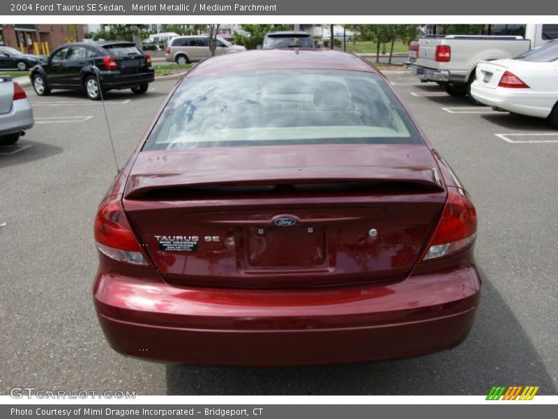 Merlot Metallic / Medium Parchment 2004 Ford Taurus SE Sedan
