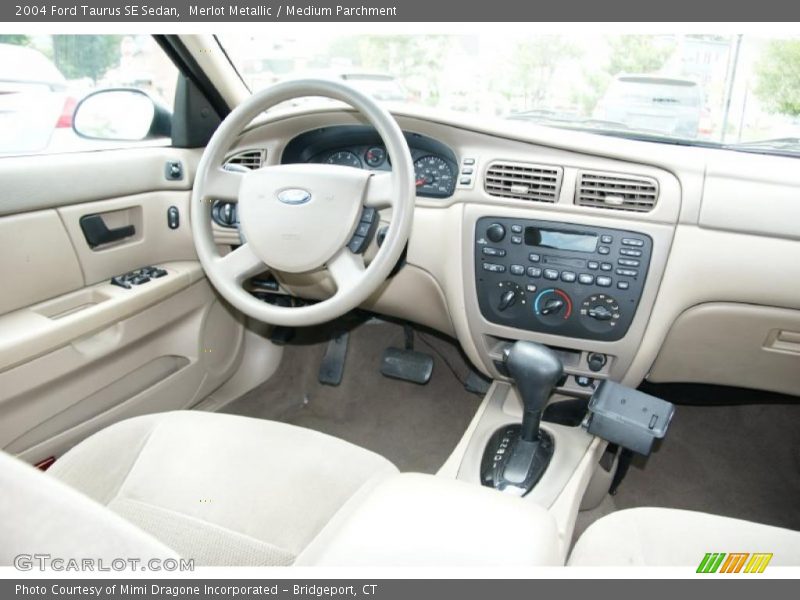 Merlot Metallic / Medium Parchment 2004 Ford Taurus SE Sedan