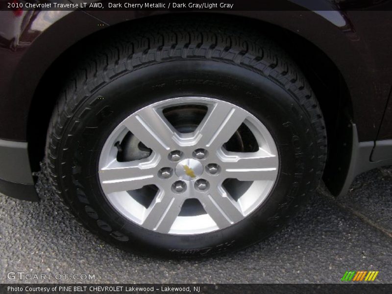 Dark Cherry Metallic / Dark Gray/Light Gray 2010 Chevrolet Traverse LT AWD